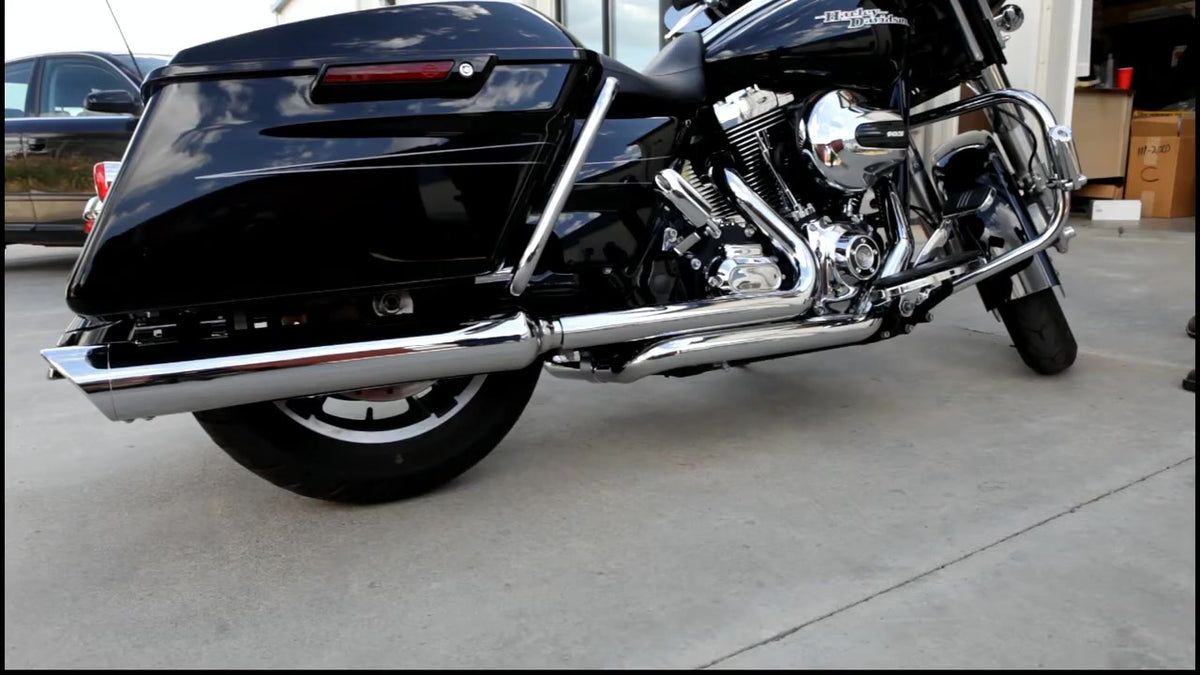 Chrome TAB Performance 2-into-2 touring headers with chrome heat shields installed on a black Twin Cam Harley-Davidson Street Glide, right side view