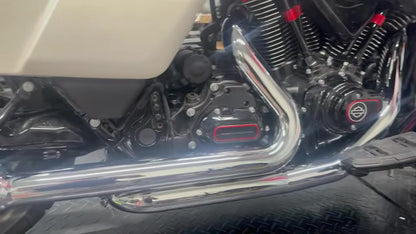 Close-up of chrome TAB Performance Redline 2-2 stepped headers installed on a white Harley-Davidson CVO Road Glide ST, right side